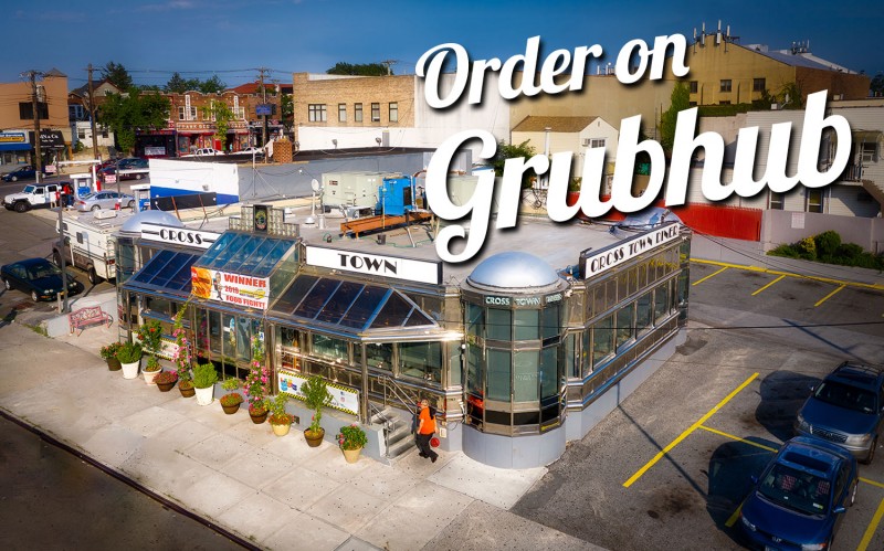 This aerial image captures the iconic Crosstown Diner, located in the heart of the Bronx at 2880 Bruckner Blvd, a short distance from the Throgs Neck Bridge. With its signature chrome exterior, retro charm, and convenient on-site parking, Crosstown Diner has become a go-to dining destination for Bronx residents and visitors alike. Offering a menu packed with all-day breakfast items, handcrafted burgers, fresh seafood, hearty steaks, and vegetarian-friendly options, Crosstown Diner is celebrated for serving high-quality, freshly prepared dishes. Its star dessert, Papa’s Cheesecake, is a Bronx legend and a must-try for anyone visiting the diner.  The prominently displayed "Order on Grubhub" sign signals the diner’s embrace of modern dining convenience. With seamless online ordering and delivery options available, Crosstown Diner combines the nostalgia of a classic American diner with the ease of digital-age dining. Whether you’re stopping by for a family meal, grabbing a quick bite with friends, or ordering delivery, Crosstown Diner is widely recognized as one of the top diners in the Bronx, serving its community for over five decades.